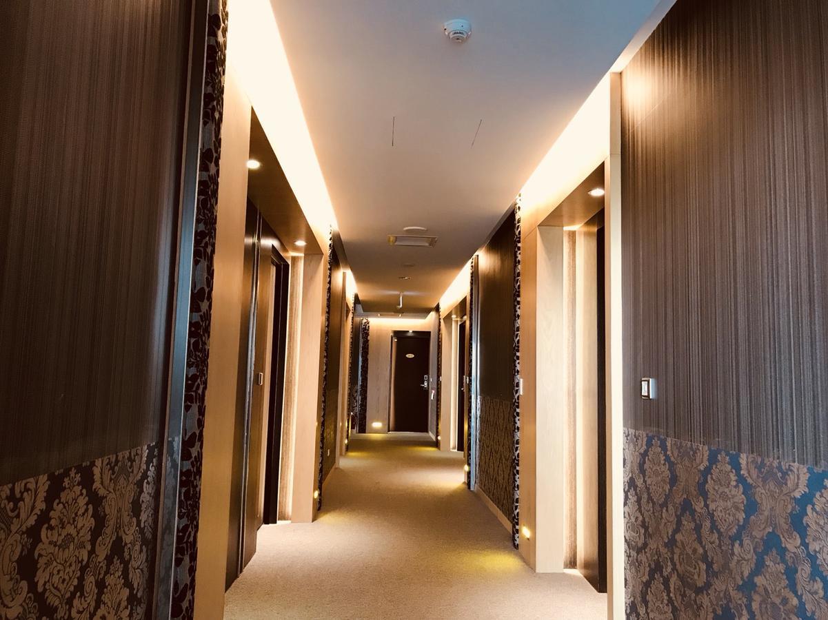 Yunlin Commerce Ryokan Tuku Bagian luar foto