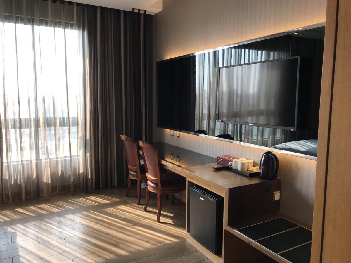 Yunlin Commerce Ryokan Tuku Bagian luar foto