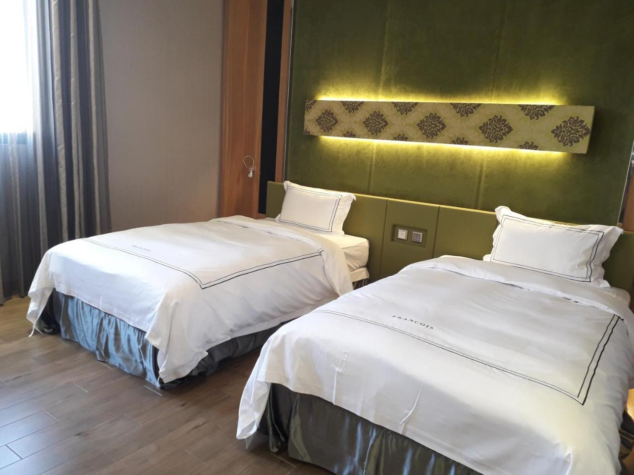 Yunlin Commerce Ryokan Tuku Bagian luar foto